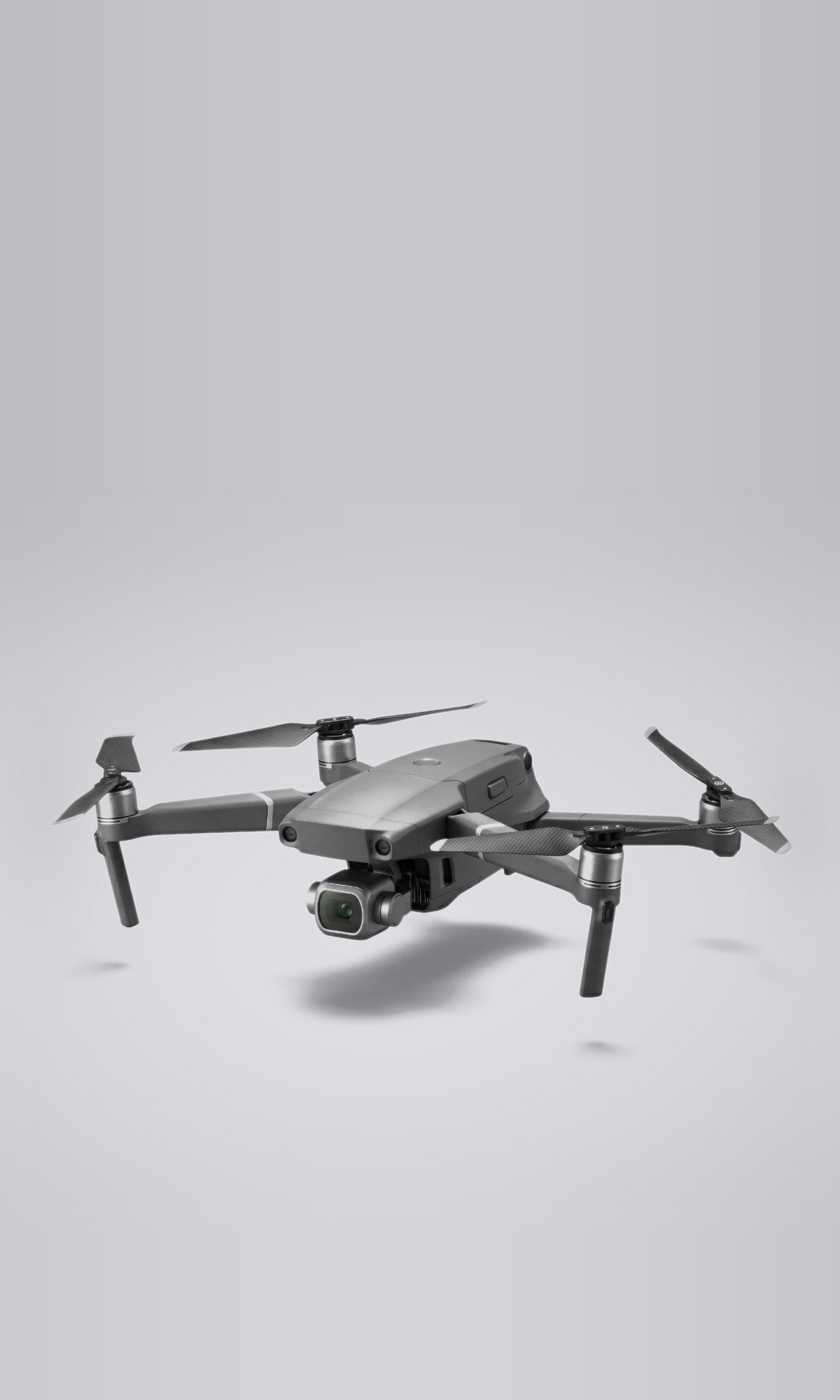 The Caddi drone, a compact folding quadcopter, against a soft studio backdrop.